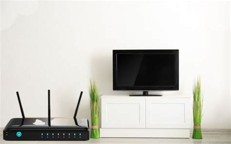 router behind tv|wifi router near tv.